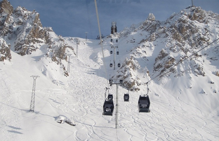 A gondola on a snowy mountain in Courchevel France