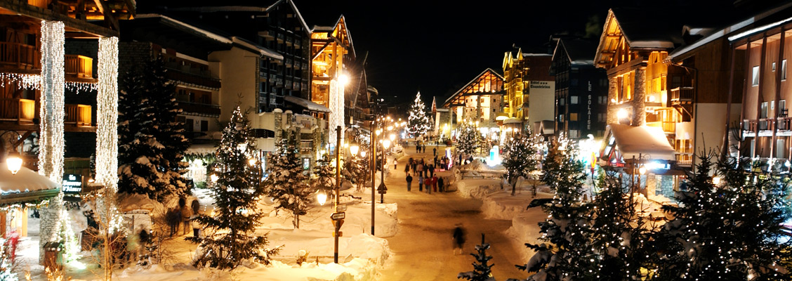 The main road of the luxury ski resort Val d'Isère during a festive season
