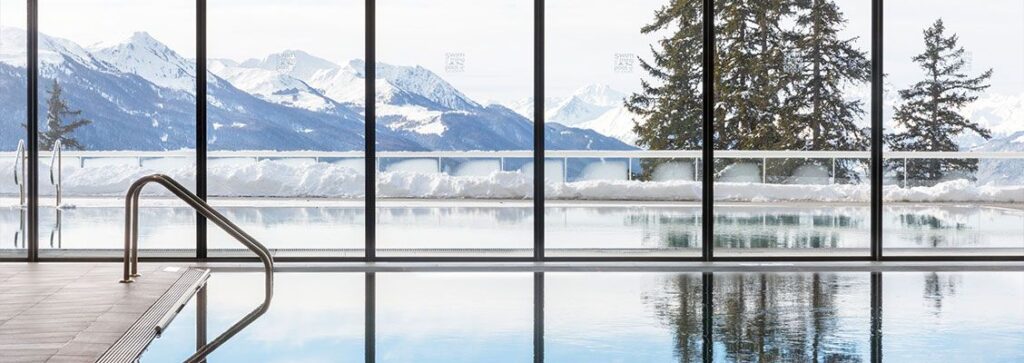 An indoor pool at a luxury ski hotel