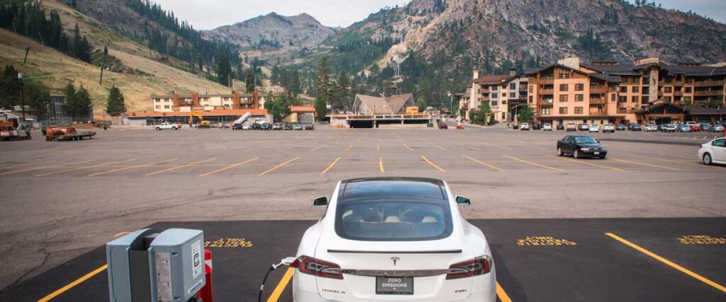 An electric car at a charging station in Palisades Tahoe ski resort