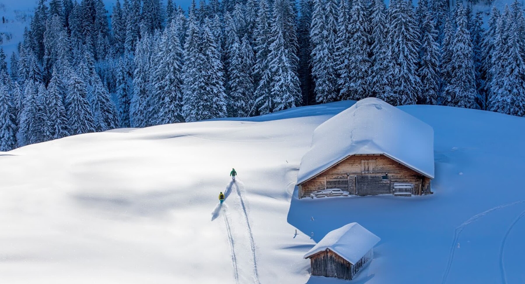 A small ski chalet in the snowy woods in Norway