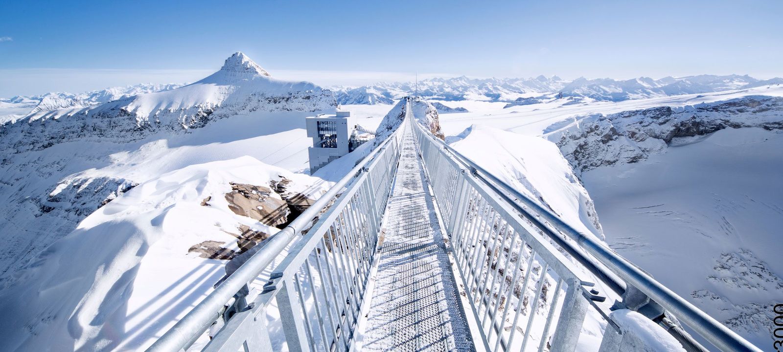 A walkway in the snowy mountains