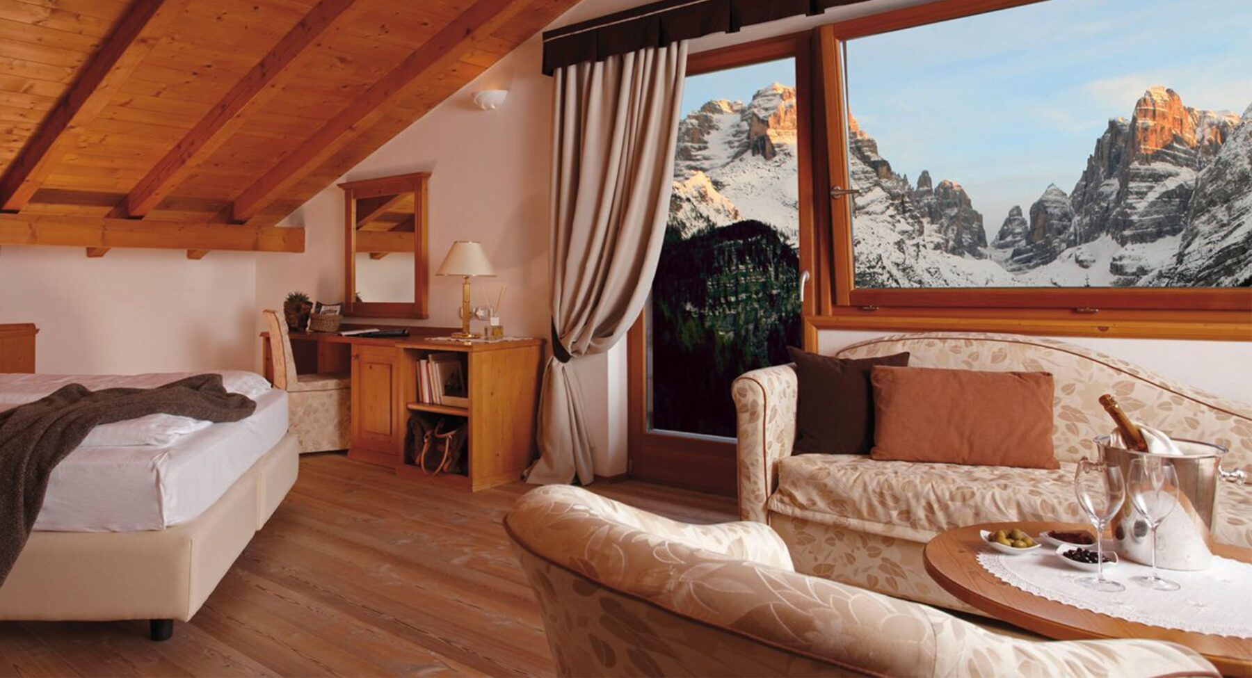 Interior of a bedroom at a luxury ski hotel in Italy