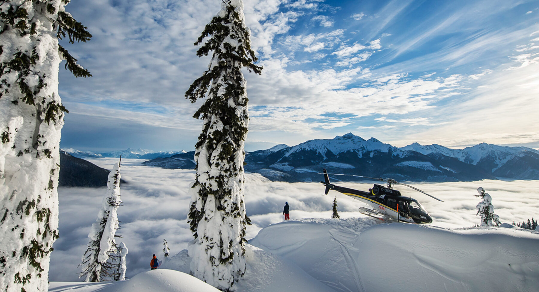A helicopter unloading skiers in Panorama