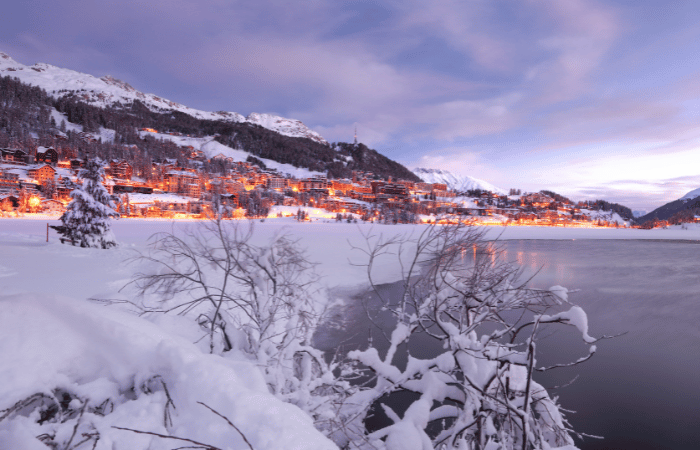 The luxury ski resort of St. Moritz across the lake