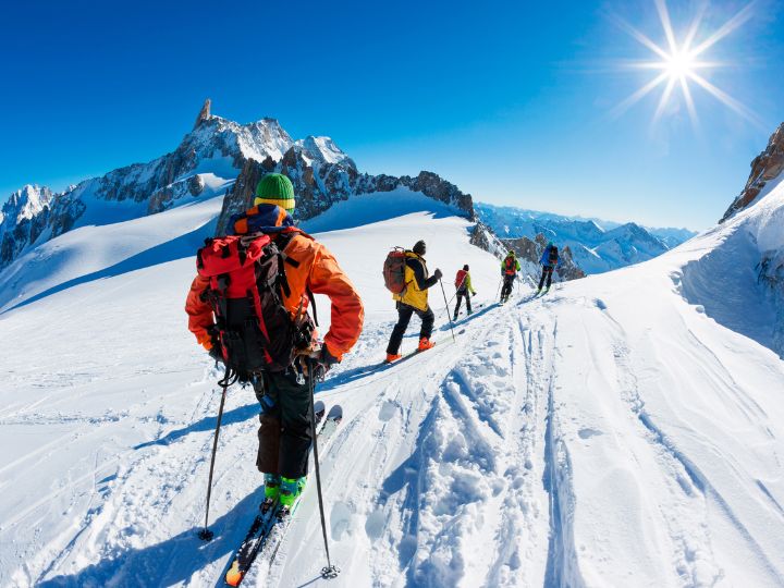 Skiing down mountain