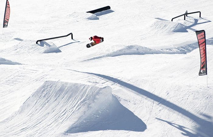 Snowboarder jumping in Avoriaz snow park