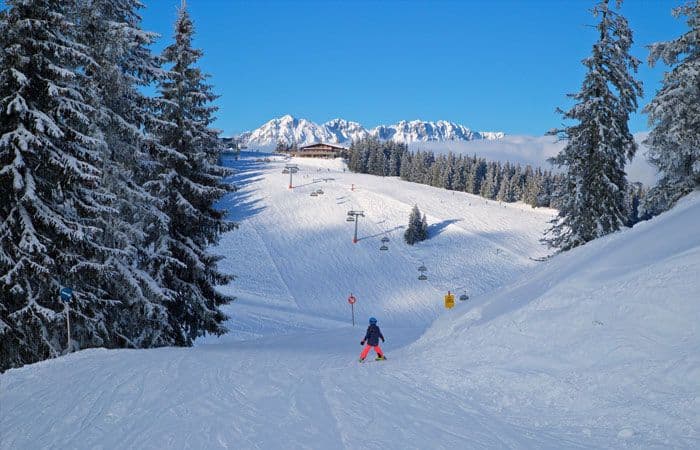 family skiing Austria