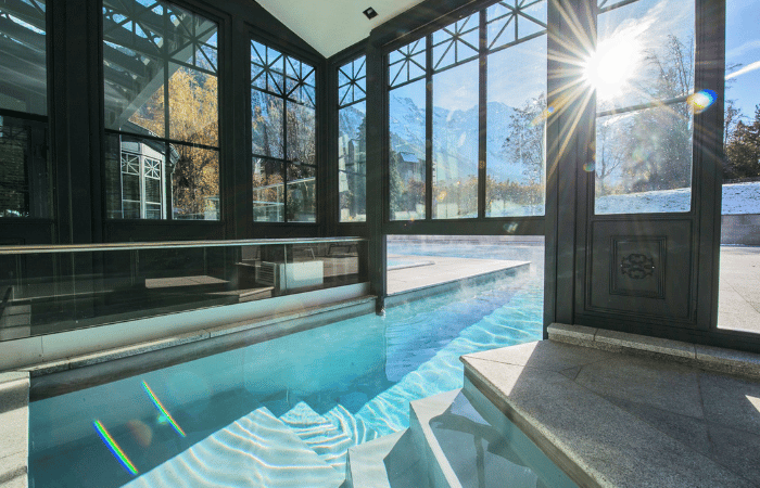 The indoor-outdoor pool in the spa of Hotel Mont Blanc