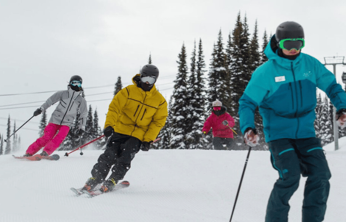 Teenagers skiing