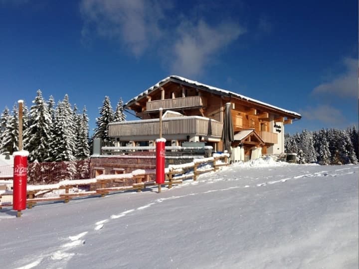 The exterior of Chalet Alpine Lodge, a VIP ski chalet