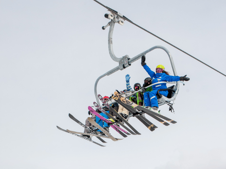 A family on a chair lift at Breckenridge ski resort